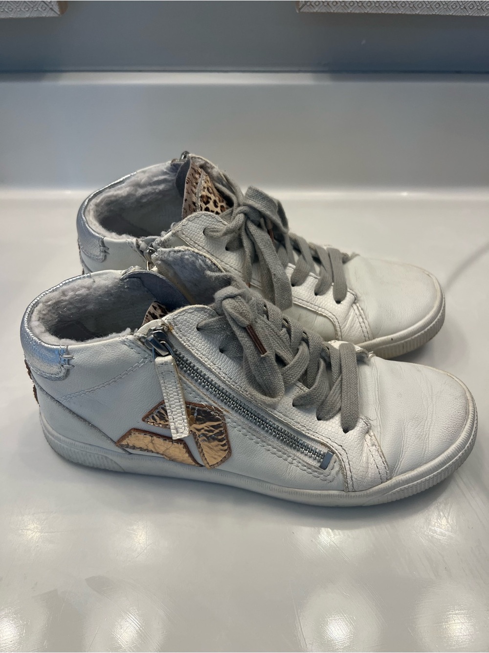 Womens Dolce Vita Zonya White High-Top Sneakers with Gold Accent